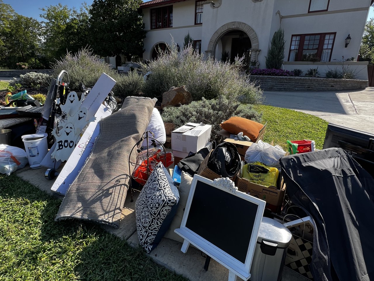 Texas Junk Boyz crew clearing out a residential estate property